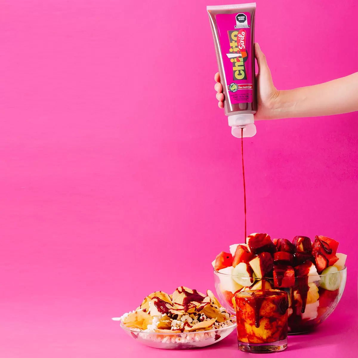 Chilito Sirilo product pouring sauce on snacks